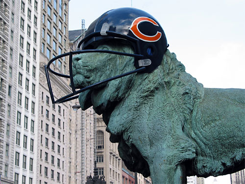 Bears helmet on lion statue at Art Institute of Chicago