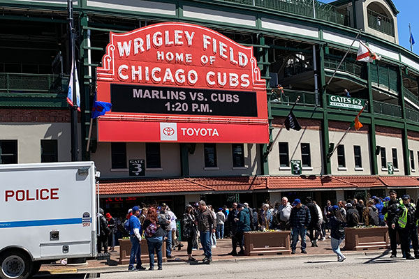 Wrigley Field marquee reads - Marlins vs. Cubs 1:20 P.M.