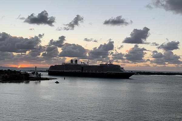 Ship Enters Port with sun rise in background on Sunday, November 10