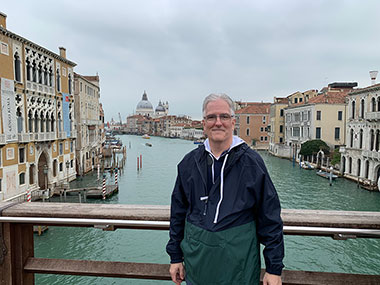 Pat in front of a Venice canal