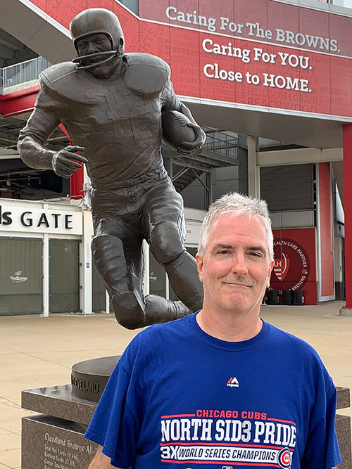 Pat and statue of Jim Brown