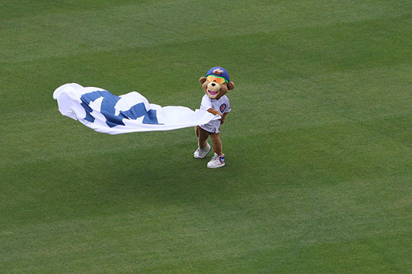 Mascot Clark waves W flag