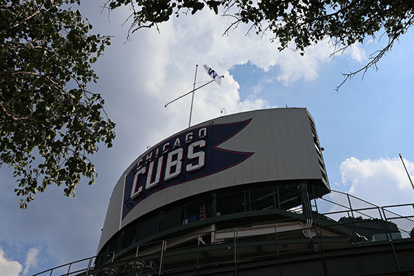 W flag flies over Cubs scoreboard