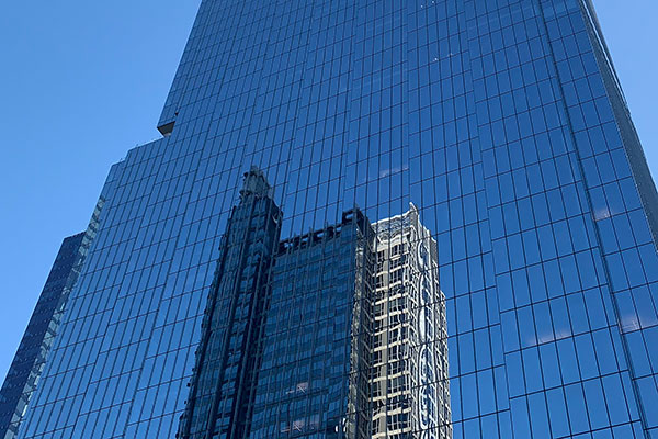 Building reflects image of another building