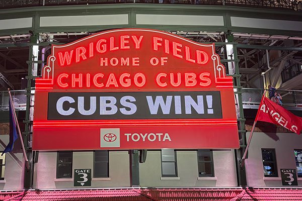 Wrigley Field marquee reads Cubs Win!