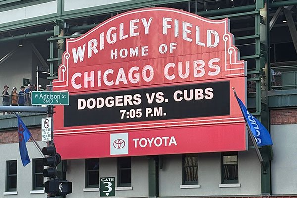 Wrigley Field Marquee reads Dodgers vs. Cubs 5:05 p.m.