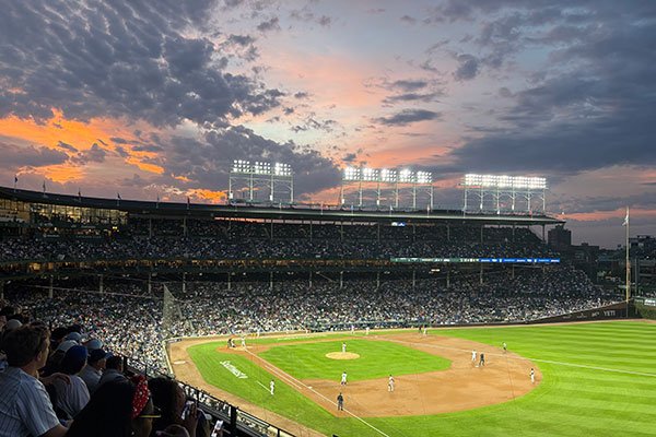 Sun sets beyond Wrigley Field