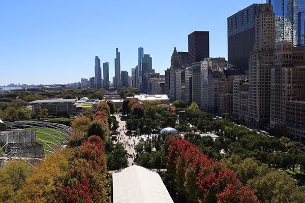 View of skyline beyond park from One Prudential Plaza