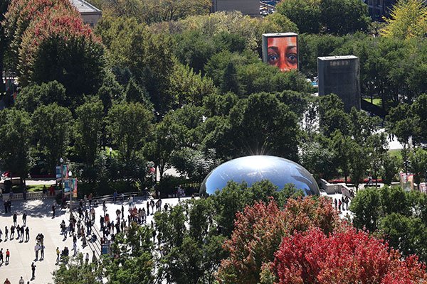 People gather in park around Cloudgate