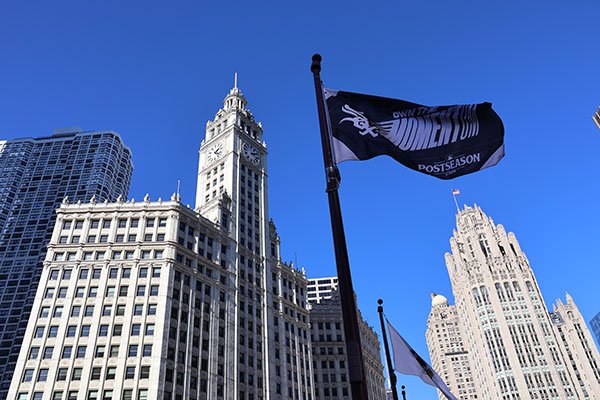 Flag in front of Wrigley Building