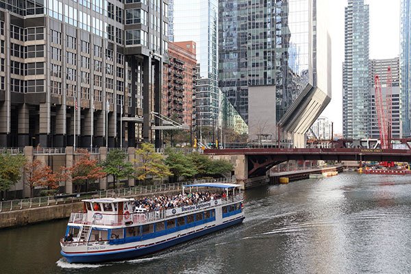 Boat full of people on South Branch of Chicago River
