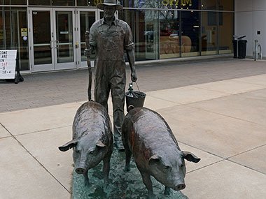 Entrance of SPAM Museum with farmer and pigs statue