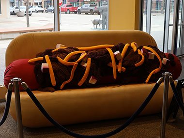 Giant chilli dog couch