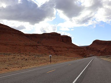 Road along red cliffs