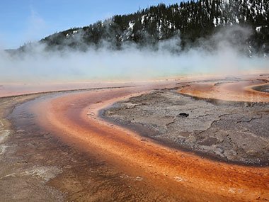 hills beyond steam of pool
