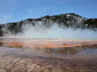 Steam above Yellowstone National Park geyser pool