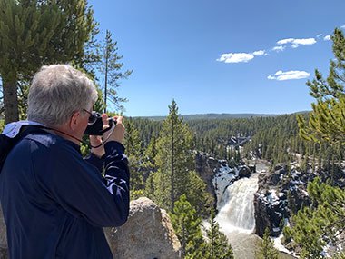 Pat takes picture of waterfall - Yellowstone National Park