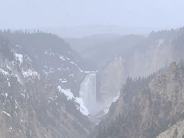 Yellowstone National Park Lower Falls while it snows
