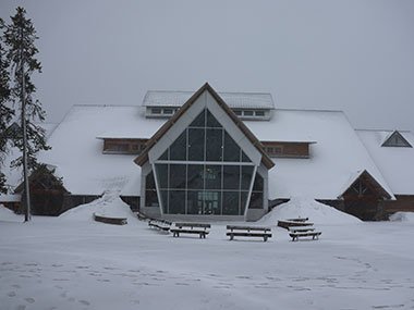 Snow falls on Visitor Center of Yellowstone National Park