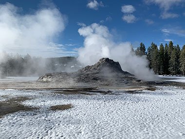 Geyser steams - Yellowstone National Park