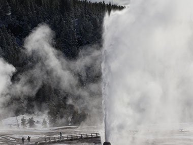 People watch geyser erupt