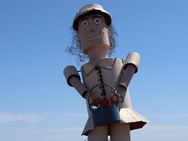 Tin Family sculpture of woman - Enchanted Highway