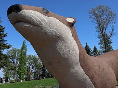 Trees stand behind World's Largest Otter