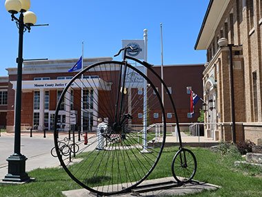 Old fashioned bicycle in front of building