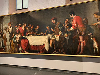 Painting of people dining