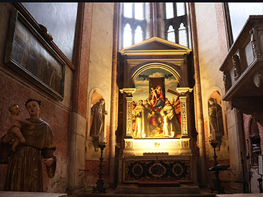 Statue in front of altar