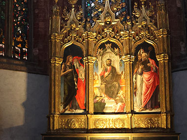 altar with painting illuminated