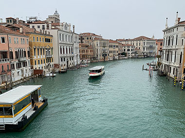 Two boats pass in canal