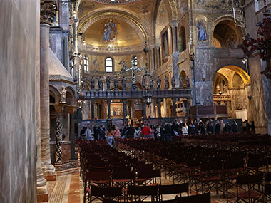 Altar view with people walking in front