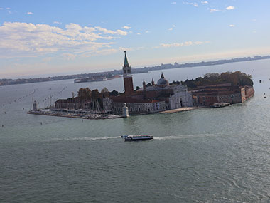 Boat passes by an island