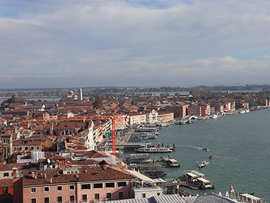 Boats docked along the water in Venice