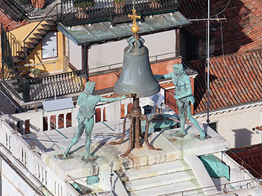 Statues on top of clock tower