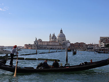 Gondola passses by a church