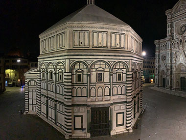 Baptistery at night with street lights shining