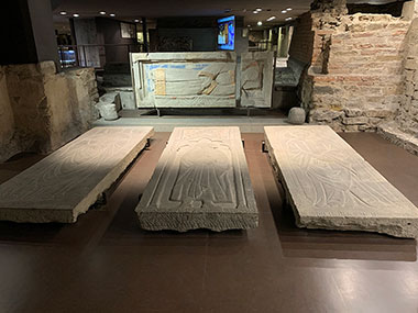 Three graves in crypt