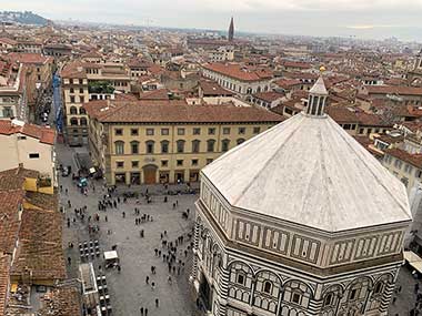 Baptistery with city beyond