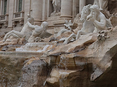 Water flowing over Trevi Fountain
