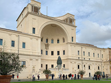 People looking at art outside the Vatican Museums