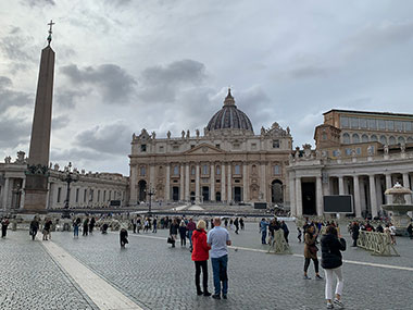 People looking at St. Peter's Basilica