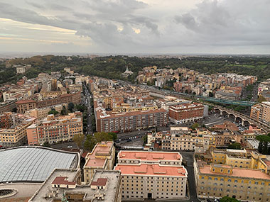 Looking out at cloudy skies over Rome from on top of  St. Peter's Basilica dome