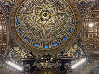 Dome above large wooden altar at St. Peter's Basilica