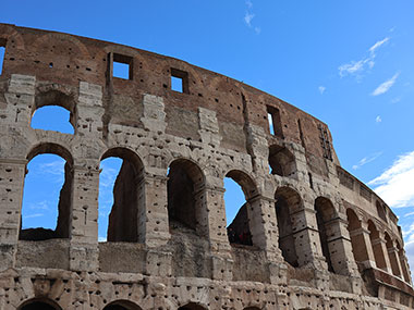 Clouds in sky behind the Colosseum