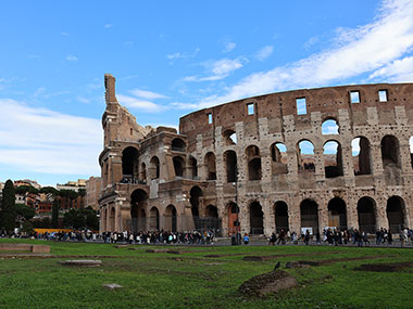 People lined up in front of the Colosseum