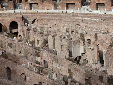 Sun shines on the floor of the Colosseum