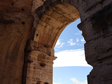 Sky though a single window of the Colosseum