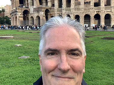 Pat in front of the Colosseum